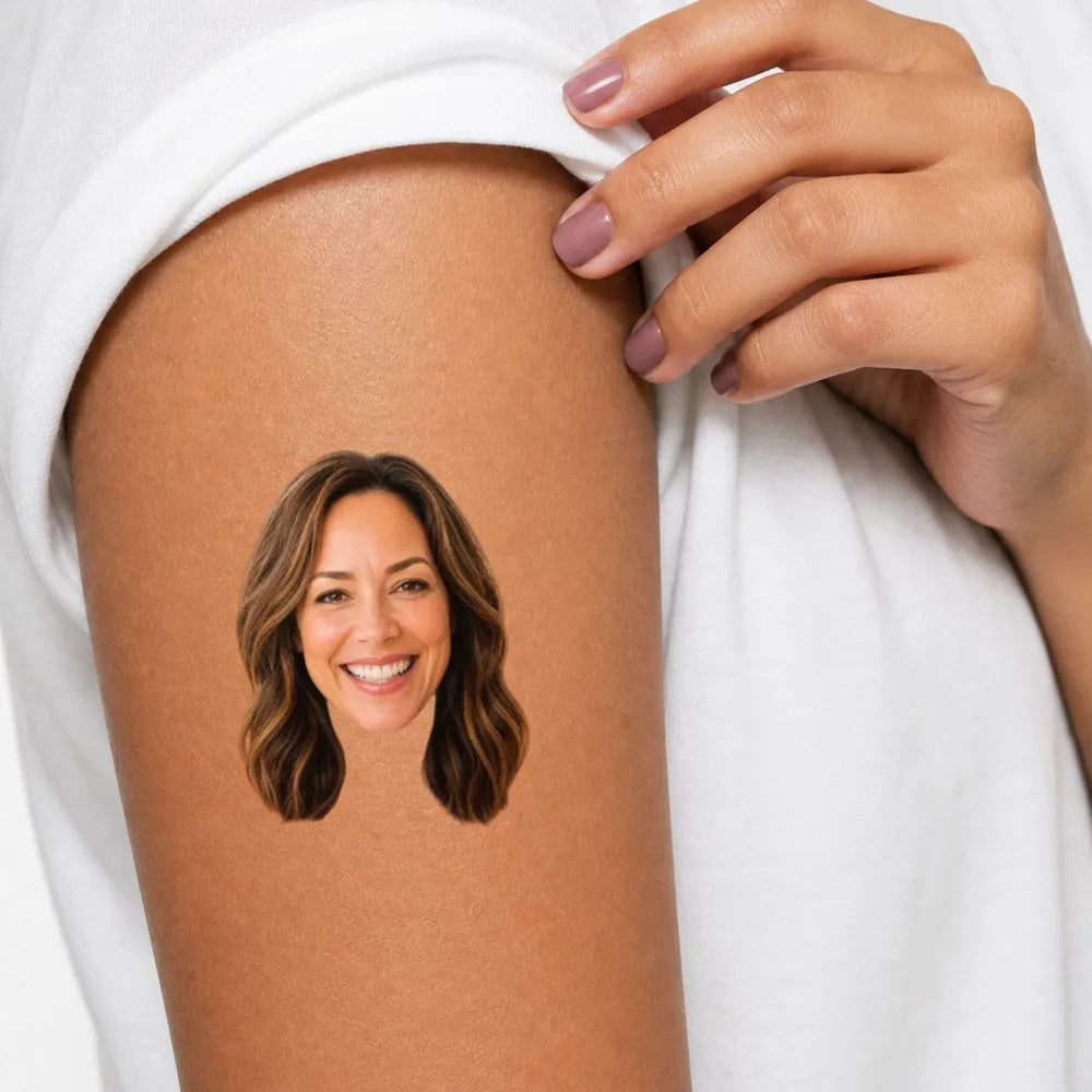 Face tattoo on forearm
